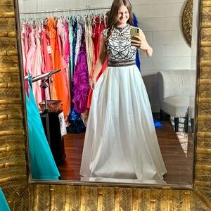 Elegant White and Black Beaded Gown